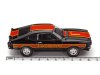 Масштабная модель Ford Mustang Cobra II 1977 черный с красным и оранжевым 1:43 IXO CLC599 ракурс 3