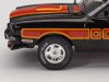 Масштабная модель Ford Mustang Cobra II 1977 черный с красным и оранжевым 1:43 IXO CLC599 ракурс 4
