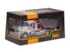 Масштабная модель Freightliner FLC 120 64 T 1977 седельный тягач, серебристый с оранжевым и красным 1:43 IXO TR200 ракурс 8