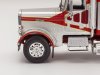 Масштабная модель Freightliner FLC 120 64 T 1977 седельный тягач, серебристый с оранжевым и красным 1:43 IXO TR200 ракурс 4