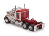 Масштабная модель Freightliner FLC 120 64 T 1977 седельный тягач, серебристый с оранжевым и красным 1:43 IXO TR200 ракурс 2