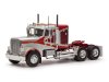 Масштабная модель Freightliner FLC 120 64 T 1977 седельный тягач, серебристый с оранжевым и красным 1:43 IXO TR200