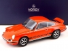 Масштабная модель Porsche 911 RS 2.7 Carrera 1973 оранжевый с черным 1:18 Norev 187681