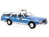 Масштабная модель Chevrolet Caprice Estate Wagon NYPD - New York Police Department 1985 Полиция Нью-Йорка, голубой с белым 1:18 MCG MCG18477 ракурс 1