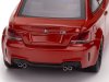 Масштабная модель BMW 1-й серии M Coupe E82 2011 оранжевый металлик 1:43 Minichamps 940020120 ракурс 5