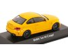 Масштабная модель BMW 1-й серии M Coupe E82 2011 желтый ракурс 2