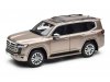 Масштабная модель Toyota Land Cruiser 300-ZX 2024 золотистый металлик