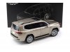 Масштабная модель Toyota Land Cruiser 300-ZX 2024 золотистый металлик ракурс 4