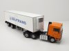 Масштабная модель Volvo F12 c полуприцепом-рефрижератором Deutrans 1980 оранжевый с белым ракурс 3