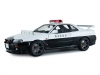 Масштабная модель Nissan Skyline GT-R (R34) 1999 полиция Японии, белый с черным 1:18 Solido S1804317