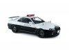 Масштабная модель Nissan Skyline GT-R (R34) 1999 полиция Японии, белый с черным 1:18 Solido S1804317 ракурс 9