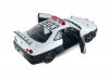 Масштабная модель Nissan Skyline GT-R (R34) 1999 полиция Японии, белый с черным 1:18 Solido S1804317 ракурс 4
