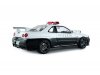 Масштабная модель Nissan Skyline GT-R (R34) 1999 полиция Японии, белый с черным 1:18 Solido S1804317 ракурс 7