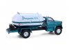 Масштабная модель Chevrolet C-60 газовоз PROPANE Co. 1982 белый с зеленым металлик 1:64 GreenLight 45200B ракурс 2