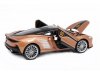 Масштабная модель McLaren GT юбилейное издание к 60-летию, золотистый 1:24 Welly 24105S ракурс 2