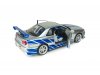 Масштабная модель Nissan Skyline GT-R (BNR34) (1999) Брайана ОКоннера из фильма Двойной форсаж, серебристый с синим 1:18 Solido S1804315A ракурс 4