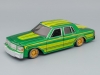 Масштабная модель Chevrolet Caprice Lowrider 1987 (1/26) зелёный металлик с жёлтым 1:24 Maisto 31044