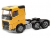 Масштабная модель Volvo FH FD седельный тягач 6x2 (2020) жёлтый 1:87 Herpa 313735