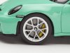 Масштабная модель Porsche 911 (992) GT3 Touring 2023 мятно-зеленый 1:43 Solido S4316503 ракурс 4