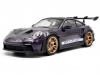 Масштабная модель Porsche 911 (992) GT3 RS Weissach Package 2024 фиолетовый металлик 1:18 Solido S1812103 ракурс 1