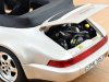 Масштабная модель Porsche 911 Carrera 2 Turbo Look кабриолет (964) 1992 серебристый металлик ракурс 4