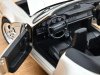 Масштабная модель Porsche 911 Carrera 2 Turbo Look кабриолет (964) 1992 серебристый металлик ракурс 2