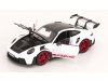Масштабная модель Porsche 911 (992) GT3 RS Weissach Package 2022 белый, черный, красный 1:18 Norev 187373 ракурс 2