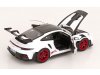 Масштабная модель Porsche 911 (992) GT3 RS Weissach Package 2022 белый, черный, красный 1:18 Norev 187373 ракурс 4